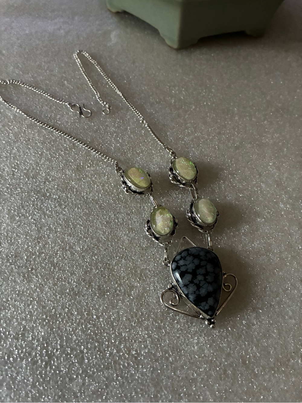 Silver Pendant Necklace with Black Snowflake Stone and Opal Accents